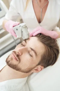 a man getting men's laser treatments